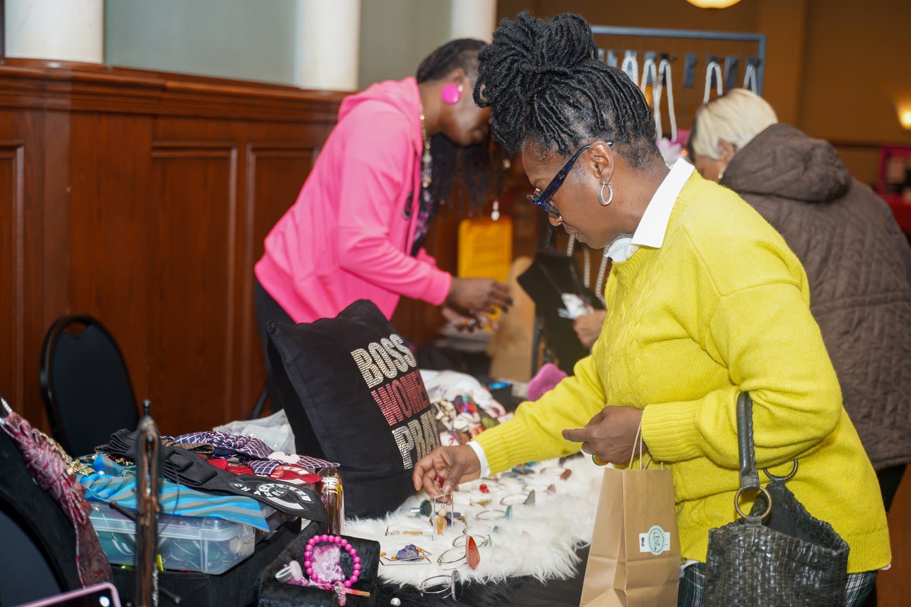 Guests shopping with a vendor at the A Date With Sis 2026 marketplace