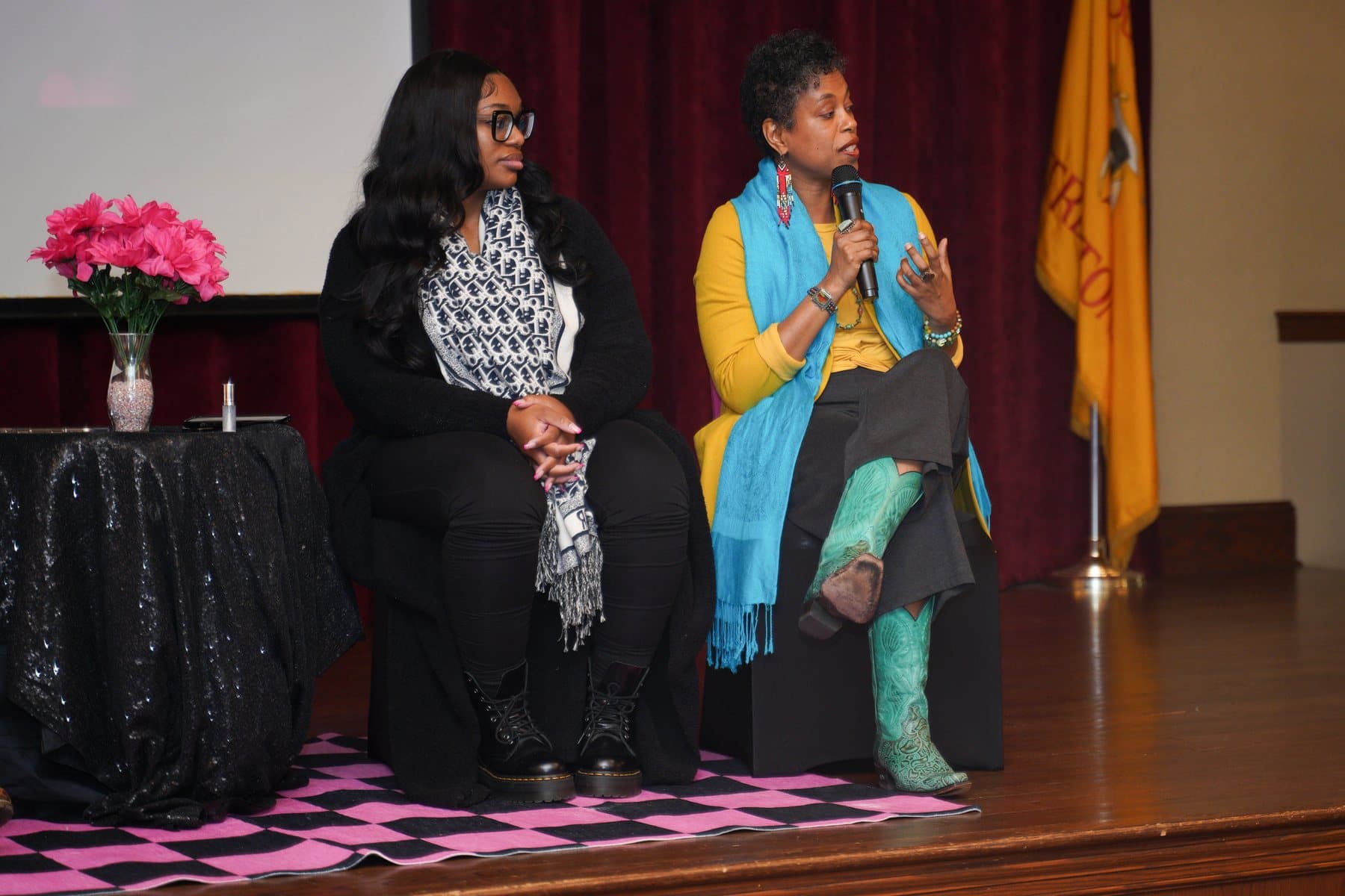 Panelists speaking during A Date With Sis