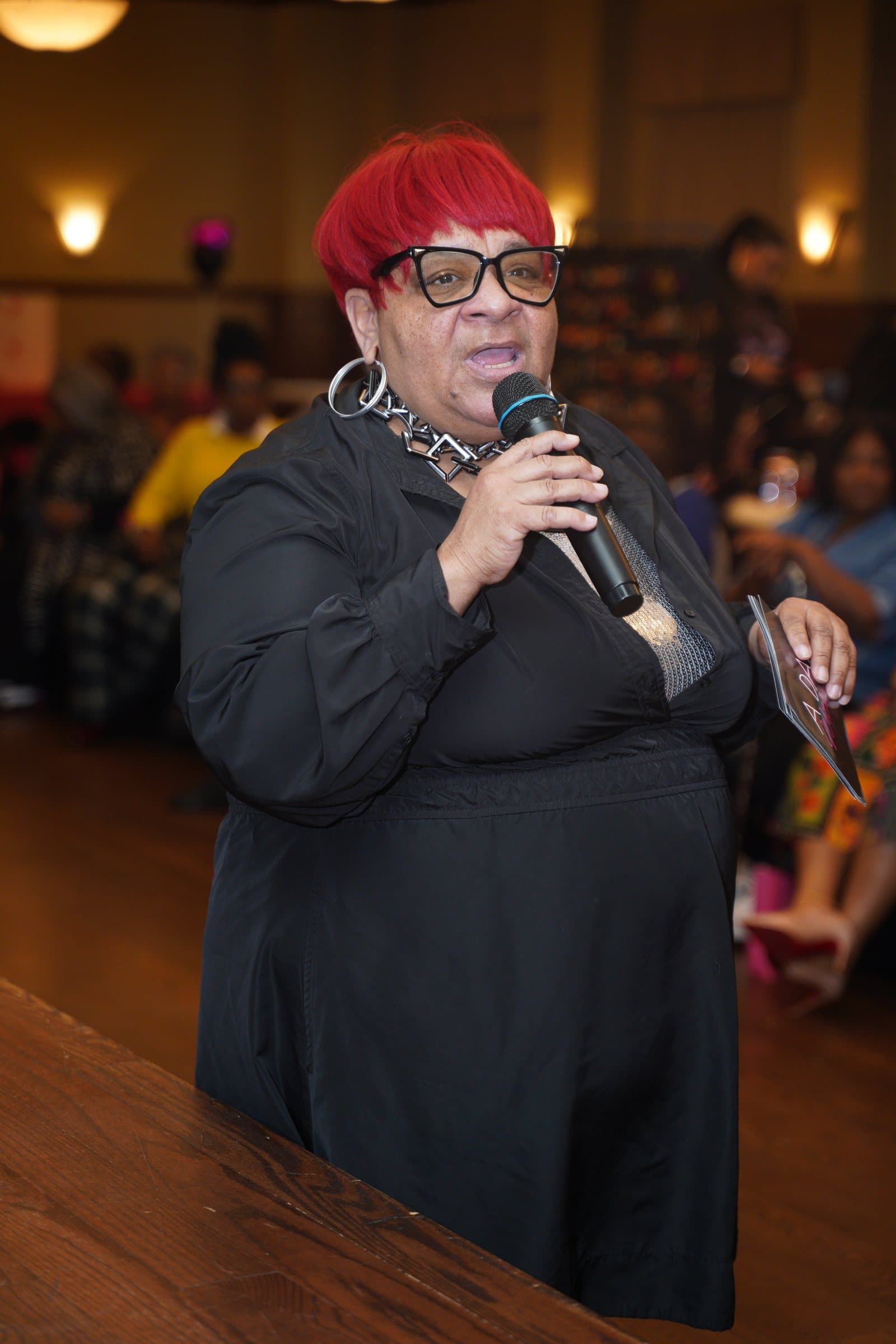 Guest sharing with a microphone during A Date With Sis 2026